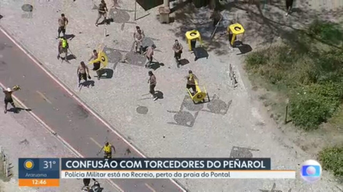 Torcedores do Peñarol causam caos no Recreio, com veículos incendiados e comércio saqueado; 283 são detidos 1 hora depois